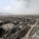 Illustration for article titled Photos from the aftermath of the devastating Tianjin explosion